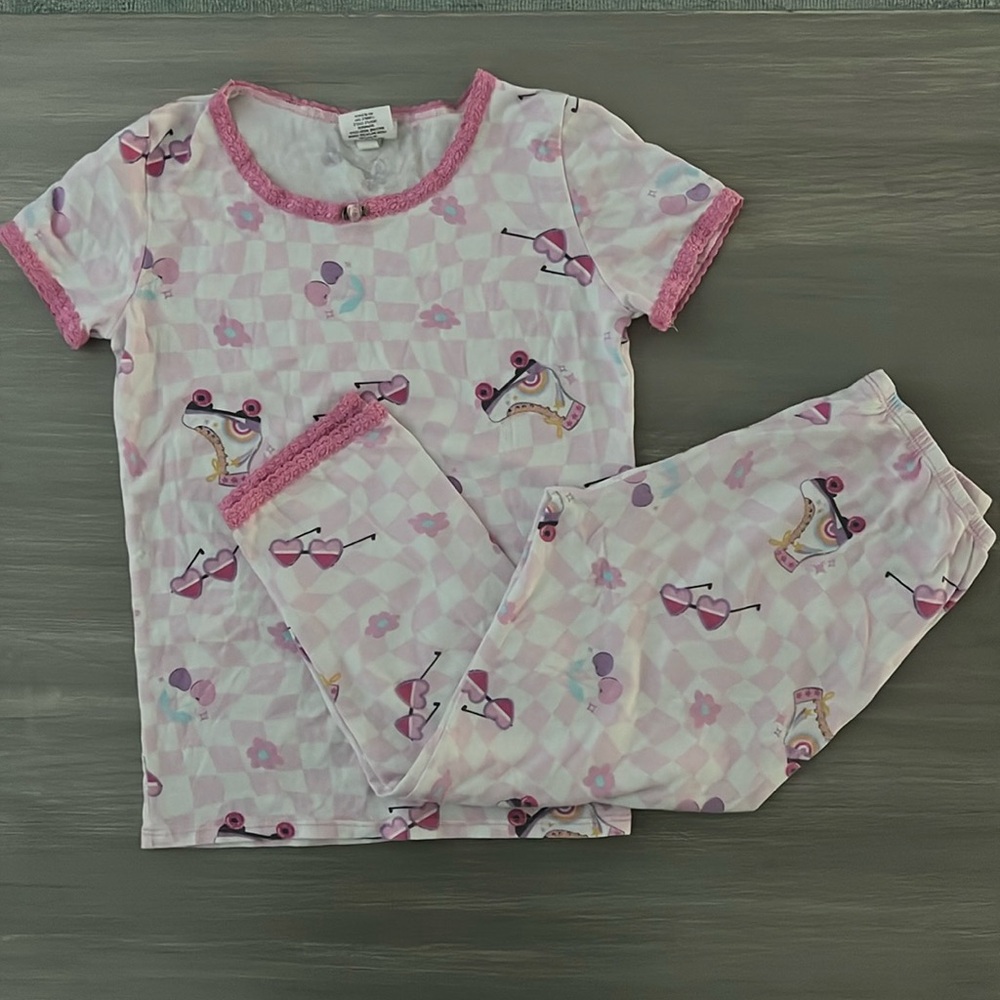 Pink Girls' Two-Piece Pajama Set with Skate & Sunglasses Print